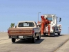 1983 Dodge Pickup being pulled out of the water at Liberty Park's Freedom Point.