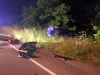 Ford Mustang went off an embankment after colliding with a Mazda Miata.  (Photo by CPD-Jim Knoll)