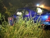 Ford Mustang went off an embankment after colliding with a Mazda Miata.  (Photo by CPD-Jim Knoll)