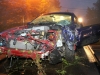 The Ford Mustang after it was pulled out of the embankment and loaded onto a tow truck. (Photo by CPD-Jim Knoll)