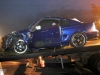 The Ford Mustang after it was pulled out of the embankment and loaded onto a tow truck. (Photo by CPD-Jim Knoll)