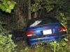 Ford Mustang went off an embankment after colliding with a Mazda Miata.  (Photo by CPD-Jim Knoll)