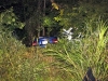 Ford Mustang went off an embankment after colliding with a Mazda Miata.  (Photo by CPD-Jim Knoll)