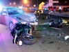 A Pontiac Grand Am turns in front of three motorcycles on Fort Campbell Boulevard Wednesday night. All three motorcycles collided with the car.