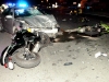 A Pontiac Grand Am turns in front of three motorcycles on Fort Campbell Boulevard Wednesday night. All three motorcycles collided with the car.