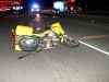 A Pontiac Grand Am turns in front of three motorcycles on Fort Campbell Boulevard Wednesday night. All three motorcycles collided with the car.