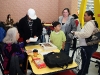 A family getting checked in for shopping. (Photo by CPD-Jim Knoll)