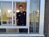 Clarksville Police Officers talking with McDonald's customers on National Coffee with a Cop Day.