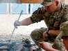 U.S. Army Lt. Col. David Preston, 4th Brigade Combat Team, 101st Airborne Division, Task Force Currahee, from Belchertown, MA, cooks steaks on July 18th for Soldiers deployed to Combat Outpost Sar Howza, Paktika Province. (Photo by U.S. Army Sgt. Charles Crail, Task Force Blackhawk Public Affairs)