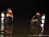 Montgomery County Rescue Squad diver Tim Manners (left) and Dustin Haas (right) in the water to hook up to the submerged vehicle