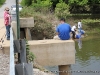 Some people fishing off a bridge at Cross Creeks.