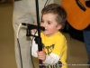 Slaten, son of Ben and Jessica Workman sings a few words for the crowd at the Chili Supper.