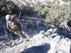 Sgt. Brent Eichler, an infantryman with 1st Platoon, 1st Battalion, 506th Infantry Regiment "Red Currahee," 4th Brigade Combat Team, 101st Airborne Division (Air Assault), stops with some of his fellow Currahees during the walk up a mountain trail on a joint patrol with the Afghan National Army soldiers with 6th Khandak, 1st Brigade, 203rd Corps from Combat Outpost Wilderness, Afghanistan, Oct. 21, 2013. (U.S. Army photo by Staff Sgt. Todd A. Christopherson, 4th Brigade Combat Team Public Affairs)