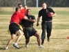 FORT CAMPBELL, Ky- A defender attempts to cutoff the NCOs ball carrier as his blocker keeps the sideline clear for his quarterback during the first annual 1st Battalion, 506th Infantry Regiment, 4th Brigade Combat Team, 101st Airborne Division, Turkey Bowl, November 21, 2012, with the officers managing to edge the non-commissioned officers by one touchdown to claim victory at Fort Campbell, Ky. (U.S. Army photo by Maj. Kamil Sztalkoper, 4th Brigade Combat Team Public Affairs)