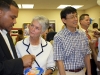 Pastor Timothy Grant chats with Sen. Kurita, w/her husband, George.