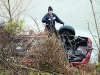 Workers preparing to remove the Durango from the river bank. (Photo by CPD-Jim Knoll)