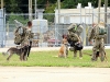 Dog Handlers with 2nd Brigade Combat Team, 101st Airborne Division (Air Assault), rest their Tactical Explosive Detection Dogs after landing at Fort Campbell Army Airfield, Fort Campbell, KY, August 24th. This is the first of two flights returning Combined Task force Strike dog handling Soldiers from Afghanistan to Fort Campbell. (U.S. Army Photo By Spc. Shawn Denham, PAO, 2nd BCT, 101st Abn. Div.)