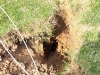 Hole left after the electrical pole was hit by car. (Photo by CPD – Jim Knoll)