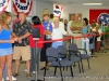 Approximately 100 people stand in line waiting to vote.