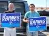 Tim Barnes supporters Adam Green and DJ Luciano encouraging early voters to support their candidate.