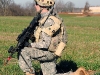 Spc. Anthony Euganeo, a rifleman with Company D, 1st Battalion, 502nd Infantry Regiment, 2nd Brigade Combat Team, 101st Airborne Division (Air Assault) pulls security during a patrol to a key leadership engagement during Strike Blitz training at Fort Campbell, Dec. 1st, 2011. Strike Blitz trains Soldiers on the real-life combat situations they can expect to see on deployment.