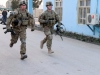 Staff Sgt. Timothy Reinker, and infantry squad leader assigned to Company A, 1st Battalion, 187th Infantry Regiment, 3rd Brigade Combat Team “Rakkasans,” 101st Airborne Division (Air Assault), and Spc. Dustin Turner, and infantryman assigned to Troop C, 1st Squadron, 33rd Cavalry Regiment, get a running start at the beginning of the brigade noncommissioned officer and Soldier of the quarter competition on Forward Operating Base Salerno, Afghanistan, Feb. 15, 2013. The competition included a five-mile march and five different combat related stations throughout the competition. (U.S. Army photo by Spc. Brian Smith-Dutton, Task Force 3/101 Public Affairs)