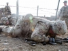 Soldiers assigned to 3rd Brigade Combat Team “Rakkasans,” 101st Airborne Division (Air Assault), crawl under barbed wire during the obstacle course portion of the brigade noncommissioned officer and Soldier of the quarter competition on Forward Operating Base Salerno, Afghanistan, Feb. 15, 2013. The competition included a five-mile march and five different combat related stations throughout the competition. (U.S. Army photo by Spc. Brian Smith-Dutton, Task Force 3/101 Public Affairs)