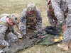 U.S. Army Fire Support specialists from the 4th Brigade Combat Team inspect the components of an OE254 antenna system prior to setting it up on Feb. 12, 92013 during a Fire Support certification class on Fort Campbell, Ky. (U.S. Army photo by Spc. Justin A. Moeller, 4th Brigade Combat Team Public Affairs)