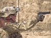 KHOWST PROVINCE, Afghanistan â?? U.S. Army Spc. Sean C. Poole, an infantryman with 2nd Battalion, 506th Infantry Regiment, 4th Brigade Combat Team â??Curraheeâ?, 101st Airborne Division (Air Assault), fires an M9 at a target while competing for Soldier of the Quarter at forward operating base Salerno, Afghanistan, July 14, 2013. (U.S. Army photo by Sgt. Justin A. Moeller, 4th Brigade Combat Team Public Affairs)