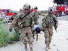 U.S. Soldiers with 2nd platoon, Whiskey Company, 2nd Battalion, 506th Infantry Regiment, attached to the 4th Brigade Special Troops Battalion, transport a simulated casualty to the casualty collection point during a mass casualty exercise at Forward Operating Base Salerno, Khowst province, Afghanistan, Aug. 6, 2013. (U.S. Army photo by Staff Sgt. Todd A. Christopherson/Released)