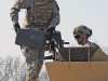 A range safety from the 3rd Brigade Combat Team "Rakkasans," 101 Airborne Division, loads an ammo box into the mounted MK 19 grenade machine gun for a Soldier to fire Nov. 26 at Fort Campbell, Ky. The range gives Soldiers the opportunity to familiarize themselves with the weapon system for Individual Readiness Training in preparation for a deployment to Afghanistan. (U.S. Army photo taken by Sgt. Alan Graziano, 3rd Brigade Combat Team, 101st Airborne Division)