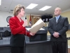 Scott Puckett receiving the Mayor’s certificate. (Photo by CPD-Jim Knoll)