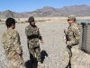 Army Sgt. Daniel Clampitt, an artilleryman assigned to 3rd Battalion, 320th Field Artillery Regiment, 3rd Brigade Combat Team “Rakkasans,” 101st Airborne Division (Air Assault), with the help of a translator discusses the training plan for the day with an Afghan National Army soldier at Camp Parsa, Afghanistan, March 30, 2013. Clampitt was tasked with training the ANA with the proper use of the D-30 Howitzer artillery cannon through this deployment. (U.S. Army Photo by Spc. Brian Smith-Dutton TF 3/101 Public Affairs)