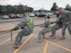 Soldiers from the 101st Sustainment Brigade, 101st Airborne Division, pull a generator returning from a deployment off of a tractor-trailer March 26 at Fort Campbell, Ky. Soldiers from the brigade deployed to Liberia and Senegal in late 2014 to provide humanitarian assistance during the Ebola outbreak. (U.S. Army photo by Sgt. Leejay Lockhart, 101st Sustainment Brigade Public Affairs)