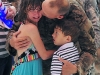 Staff Sgt. Julian Howell from Company A, 1st Battalion, 187th Infantry Regiment, 3rd Brigade Combat Team “Rakkasans,” 101st Airborne Division, is welcomed home by his children at Hangar 3 on Fort Campbell, Kentucky June 8, 2015. U.S. Army photo by Spc. Eric Provost, 3rd BCT Public Affairs)