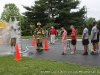 Victims stand in line for the decontamination showers