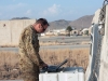 Sgt. Michael Evanson, A Company, 1st Battalion, 101st Combat Aviation Brigade, squad leader transfers mission data from one aircraft’s log book to another’s during pre-flight operations at Forward Operating Base Salerno, Afghanistan, Jan. 16, 2013. (U.S. Army photo by Sgt. Duncan Brennan, 101st CAB public affairs)