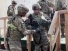 Staff Sgt. Anre P. Hall (left), a native of New York, N.Y., and casualty operations noncommissioned officer in charge, ensures the M4 carbine rifle is cleared prior to Sgt. 1st Class Kevin L. Mays, a native of Louisville, Ky., and support operations platoon sergeant, departs the firing lane, Sept. 13, 2013 at Bagram Air Field, Parwan province, Afghanistan. Both aoldiers are with the Task Force Lifeliner.  (U.S. Army photo by Sgt. Sinthia Rosario, Task Force Lifeliner Public Affairs)