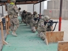 Task Force Lifeliner soldiers fire their M4 carbine rifles during M4 qualification range, Sept. 13, 2013 at Bagram Air Field, Parwan province, Afghanistan. The soldiers qualify on their weapons annually to stay current with U.S. Army standards and to sharpen their weapon skill set. (U.S. Army photo by Sgt. Sinthia Rosario, Task Force Lifeliner Public Affairs)