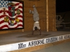 Pfc. Andre Elliott with the 101st Sustainment Brigade, Task Force Lifeliner, Joint Forces Command – United Assistance, preformed a break dance routine for the Buchanan talent show to celebrate the New Year at Camp Buchanan, Buchanan, Liberia, Dec. 31, 2014. (U.S. Army photo by Sgt. 1st Class Mary Rose Mittlesteadt, 101st Sustainment Brigade Public Affairs/RELEASED)