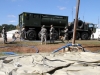 Soldiers with the129th Combat Sustainment Support Battalion, 101st Airborne Division Sustainment Brigade, 101st Airborne Division (Air Assault), fill their Load Handling System Compatible Water Tank Rack, also called a hippo, at the tactical water purification system site pumping stations Sept. 3, 2015, at the Joint Readiness Training Center’s Intermediate Staging Base in Alexandria, La. (Sgt. 1st Class Mary Rose Mittlesteadt, 101st Airborne Division Sustainment Brigade (Lifeliners) Public Affairs)