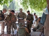 U.S. Army Soldiers from Security Forces Advisory and Assistance Team Archangel, 1st Brigade Combat Team, 101st Airborne Division, confer with Afghan National Army soldiers on the outskirts of the village of Takiya Khana, Bati Kot district, Nangarhar Province, Afghanistan, June 15, 2013. (U.S. Army photo by Sgt. Margaret Taylor, 129th Mobile Public Affairs Detachment)