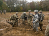 A team of Soldiers with “Attack” Company, 2nd Battalion, 502nd Infantry Regiment, 2nd Brigade Combat Team, 101st Airborne Division (Air Assault), drag a notional casualty to a medical evacuation point during a combined arms maneuver live fire exercise 23 Oct, on Range 55 at Fort Campbell, Kentucky. The exercise challenged the company to integrate a heavy weapons platoon, two light infantry rifle platoons, field artillery, battalion mortars and notional Army attack aviation and information collection assets. (U.S. Army photo by Sgt. Samantha Stoffregen, 101st Airborne Division (Air Assault) Public Affairs)