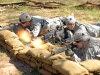 U.S. Army 1st Lt. Thomas A. Reece, a platoon leader for Company E, 2nd Battalion, 506th Infantry Regiment, 4th Brigade Combat Team, 101st Airborne Division, engages a simulated enemy opposition force with the M240B Medium Machine Gun during the Reconnaissance Lane portion of the Expert Infantryman Badge testing, March 5th, 2012 at Fort Campbell, KY. (Photo by Staff Sgt. Todd Christopherson)