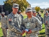 Maj. Gen. John R. “Jack” O’Connor, commanding general of Forces Command logistics, awards Sgt. Koogchan Hwan, a Soldier chef from Company D, 1st Squadron, 75th Cavalry Regiment, 2nd Brigade Combat Team, 101st Airborne Division (Air Assault), with the 2012 Outstanding Performer Award during a presentation ceremony for the Forces Command Level 45th Annual Phillip A. Connelly Award, held outside of the Strike Dining Facility, Oct. 24. (U.S. Army photo by Sgt. Keith Rogers, 2nd BCT PAO UPAR, 101st Abn. Div.)