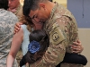 Staff Sgt. John P. Martinez, a native of Elsa, Texas, and a Military Police with the 551st Military Police Company "Hooligans," 716th Military Police Battalion, 101st Sustainment Brigade "Lifeliners," 101st Airborne Division (Air Assault), greets his family with a big hug during a welcome home ceremony April, 10 at Fort Campbell. (U.S. Army photo by Sgt. Sinthia Rosario, 101st Sustainment Brigade Public Affairs)