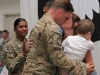 Spc. Matthew R. Smith, a native of Kill Devil Hills, N.C., and a Military Police with the 551st Military Police Company "Hooligans," 716th Military Police Battalion, 101st Sustainment Brigade "Lifeliners,"101st Airborne Division (Air Assault), greets his Family with hugs and kisses during a welcome home ceremony April 10, at Fort Campbell. (U.S. Army photo by Sgt. Sinthia Rosario, 101st Sustainment Brigade Public Affairs)