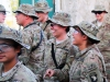 Pfc. Katie Dove, a medic with Company C, 801st Brigade Support Battalion, 4th Brigade Combat team â??Curraheeâ?, 101st Airborne Division (Air Assault), laughs with her fellow Soldiers during a patch ceremony at Forward Operating Base Salerno, Afghanistan, on June 6, 2013 (U.S. Army photo by Sgt. Justin A. Moeller, 4th Brigade Combat Team Publuc Affairs)