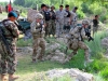 Sgt. Joseph L. Hull, an infantryman with 2nd Platoon, Easy Company, 2nd Battalion, 506th Infantry Regiment, 4th Brigade Combat Team, 101st Airborne Division, takes is turn to jump across a stream while on patrol in a village in Khowst Province, Afghanistan, on June 2, 2013. (Photo by Sgt. Justin A. Moeller, 4th Brigade Combat Team Public Affairs)