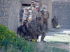 Soldiers with Easy Company, 2nd Battalion, 506th Infantry Regiment, 4th Brigade Combat Team, 101st Airborne Division, pull security while Soldiers of the Afghan National Army’s 2nd Kandak, 1st Brigade, 203rd Corps search a residence during a mission in Khowst Province, Afghanistan, on June 2, 2013. (Photo by Sgt. Justin A. Moeller, 4th Brigade Combat Team Public Affairs)